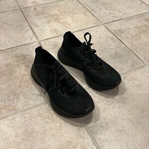 Black Nike sneakers epic react